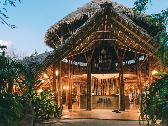 Dreamsea Playa Maderas, one of the best Nicaragua surf camps, balinese style outdoor patio with lights in the jungle