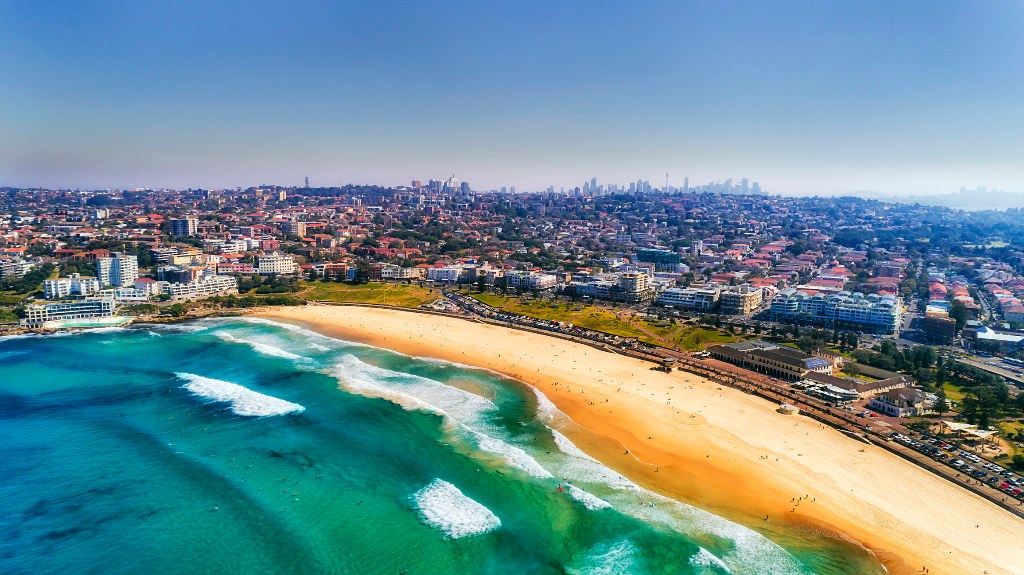Aerial shot of the surf in Bondi Beach, one of the best places to surf in October