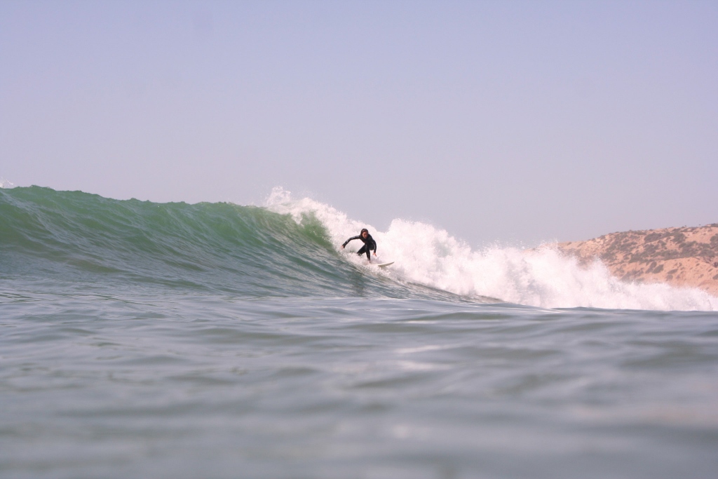 Surfer at Mysteries in Taghazout, Morocco
